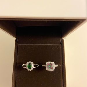 Two Silver gemstone rings.